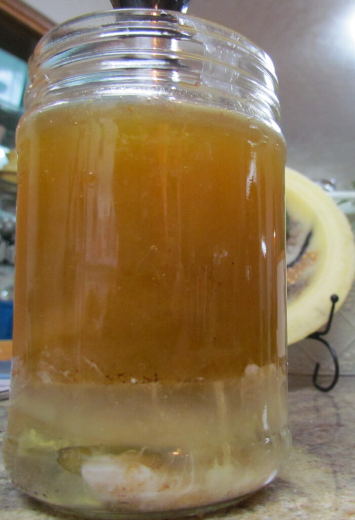Picture of mayonnaise ingredients in jar before blending