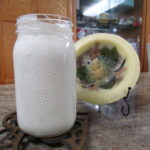 Picture of finished yogurt in a quart jar.